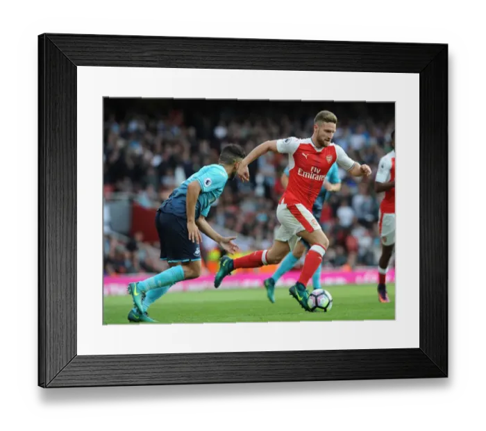 Framed Print : Arsenal vs Swansea City: Mustafi vs Taylor - Intense Clash in Premier League (2016-17) Framed Print : Arsenal vs Swansea City: Mustafi vs Taylor - Intense Clash in Premier League (2016-17)