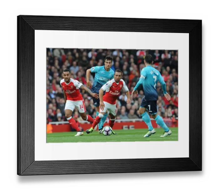 Framed Print : Arsenal Rivals Clash: Walcott vs Cazorla in Intense Premier League Battle Framed Print : Arsenal Rivals Clash: Walcott vs Cazorla in Intense Premier League Battle