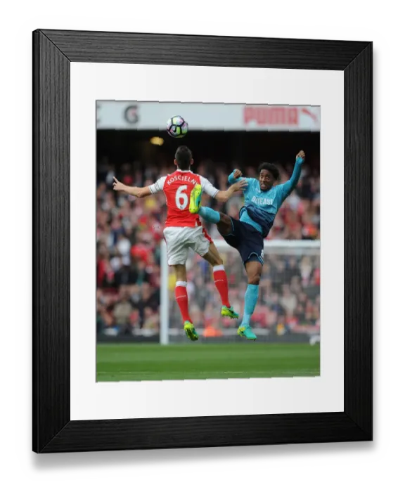 Framed Print : Arsenal's Koscielny Clashes with Swansea's Fer: A Premier League Showdown