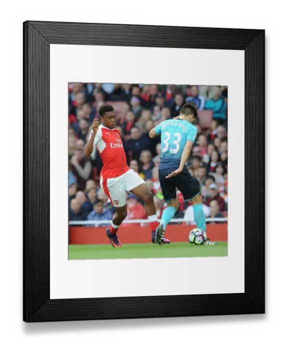 Framed Print : Alex Iwobi's Slick Nutmeg of Swansea's Federico Fernandez during Arsenal's 2016-17 Premier League Match
