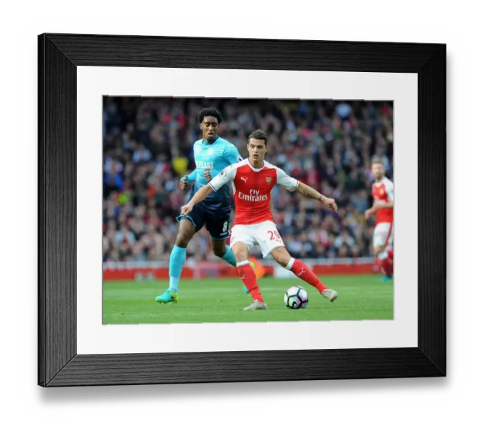 Framed Print : Xhaka Under Pressure: Arsenal's Midfielder Faces Intense Scrutiny from Swansea's Fer in Premier League Showdown Framed Print : Xhaka Under Pressure: Arsenal's Midfielder Faces Intense Scrutiny from Swansea's Fer in Premier League Showdown
