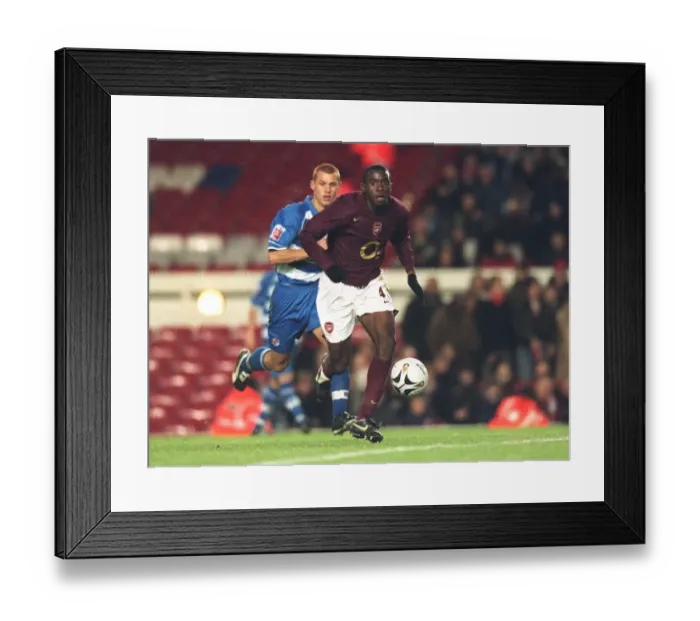 Framed Print : Arsenal Triumphs Over Reading: Fabrice Muamba and Steven Sidwell in Carling League Cup Clash at Highbury, 2005 Framed Print : Arsenal Triumphs Over Reading: Fabrice Muamba and Steven Sidwell in Carling League Cup Clash at Highbury, 2005