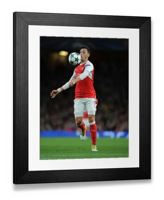 Framed Print : Arsenal's Ozil Stars: Champions League Victory over Ludogorets Framed Print : Arsenal's Ozil Stars: Champions League Victory over Ludogorets