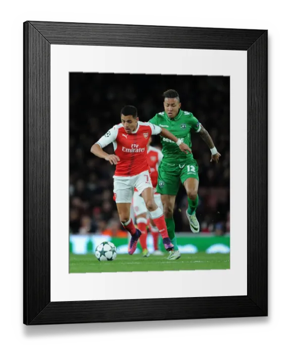 Framed Print : Arsenal's Alexis Sanchez Scores Past Ludogorets Defender in 2016-17 UEFA Champions League Clash