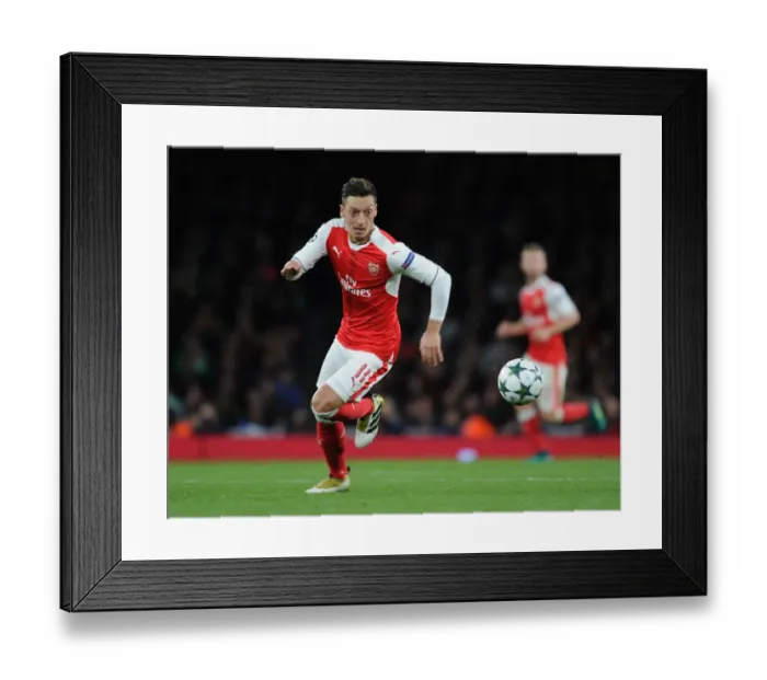 Framed Print : Arsenal's Ozil Shines: Champions League Victory Over Ludogorets Framed Print : Arsenal's Ozil Shines: Champions League Victory Over Ludogorets