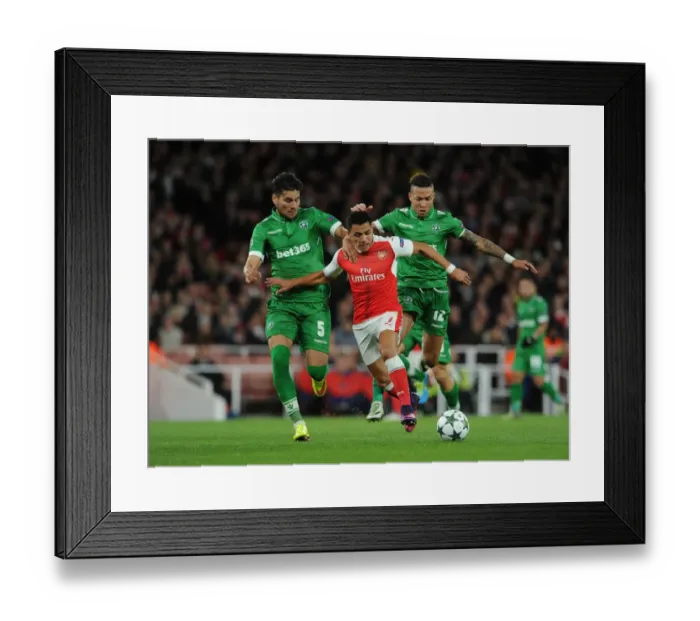 Framed Print : Alexis Sanchez vs Ludogorets: A Champions League Battle at Arsenal's Emirates Stadium