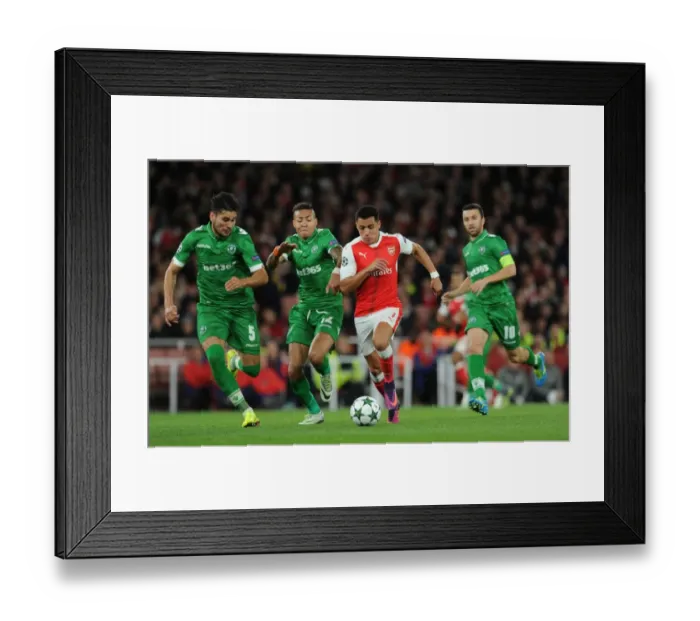 Framed Print : Arsenal's Alexis Sanchez Goes Head-to-Head with Ludogorets in Champions League Showdown