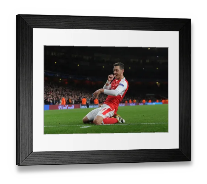 Framed Print : Mesut Ozil's Brace: Arsenal Crushes Ludogorets 5-0 in Champions League 2016-17
