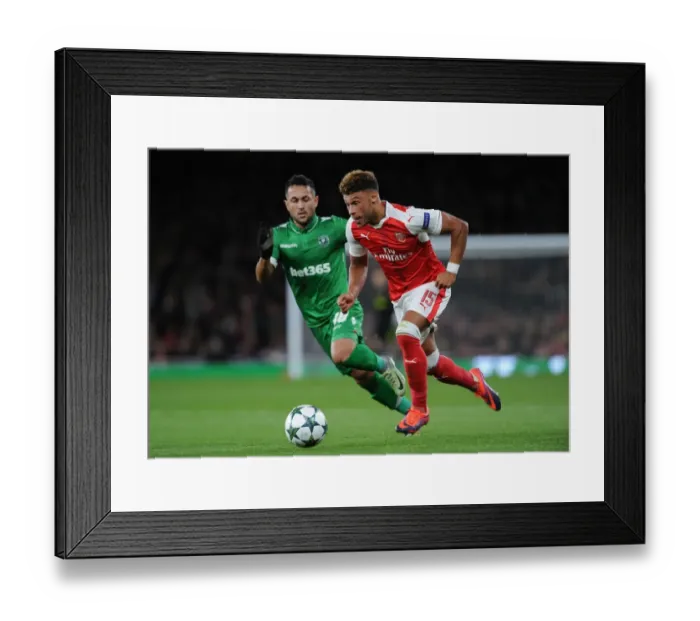 Framed Print : Arsenal vs Ludogorets: Oxlade-Chamberlain Clashes with Wanderson in Champions League Showdown Framed Print : Arsenal vs Ludogorets: Oxlade-Chamberlain Clashes with Wanderson in Champions League Showdown