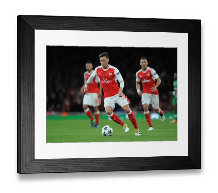 Framed Print : Arsenal's Ozil Stars: Champions League Victory over Ludogorets