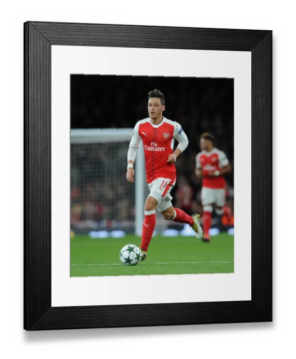 Framed Print : Ozil's Magic: Arsenal's Champions League Triumph over Ludogorets Framed Print : Ozil's Magic: Arsenal's Champions League Triumph over Ludogorets