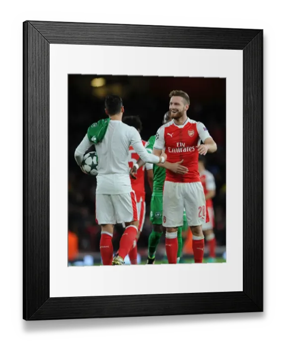 Framed Print : Arsenal FC vs PFC Ludogorets Razgrad: Mesut Ozil and Shkodran Mustafi Share a Moment after the UEFA Champions League Match Framed Print : Arsenal FC vs PFC Ludogorets Razgrad: Mesut Ozil and Shkodran Mustafi Share a Moment after the UEFA Champions League Match