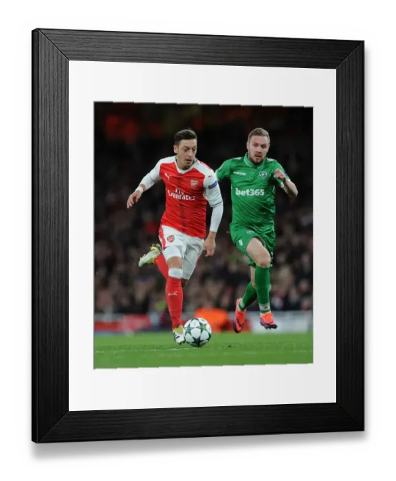 Framed Print : Mesut Ozil Scores Arsenal's Fourth Goal Against Ludogorets in 2016-17 UEFA Champions League