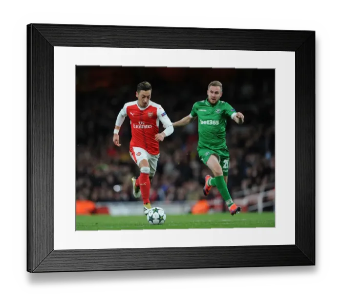 Framed Print : Mesut Ozil Scores Arsenal's Fourth Goal in Champions League Match Against Ludogorets (2016-17) Framed Print : Mesut Ozil Scores Arsenal's Fourth Goal in Champions League Match Against Ludogorets (2016-17)