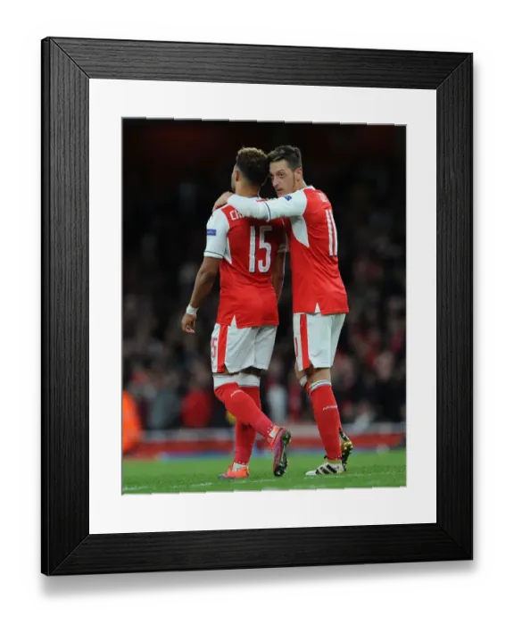 Framed Print : Arsenal FC: Ozil and Oxlade-Chamberlain in Deep Conversation during Arsenal v Ludogorets Razgrad UEFA Champions League Match