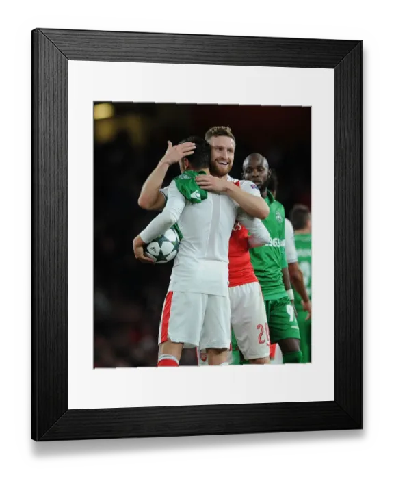 Framed Print : Arsenal: Ozil and Mustafi Embrace Victory After Arsenal FC vs. PFC Ludogorets Razgrad, UEFA Champions League (2016-17)
