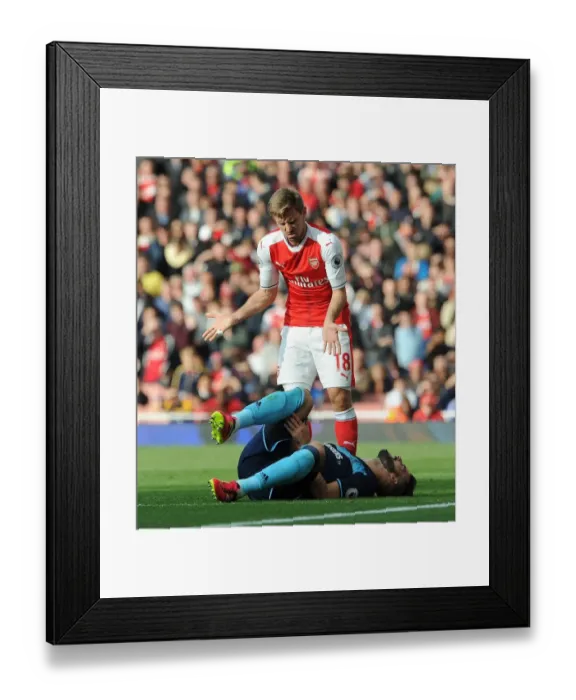 Framed Print : Monreal vs Negredo: Intense Moment at Arsenal vs Middlesbrough, 2016-17 Premier League Framed Print : Monreal vs Negredo: Intense Moment at Arsenal vs Middlesbrough, 2016-17 Premier League