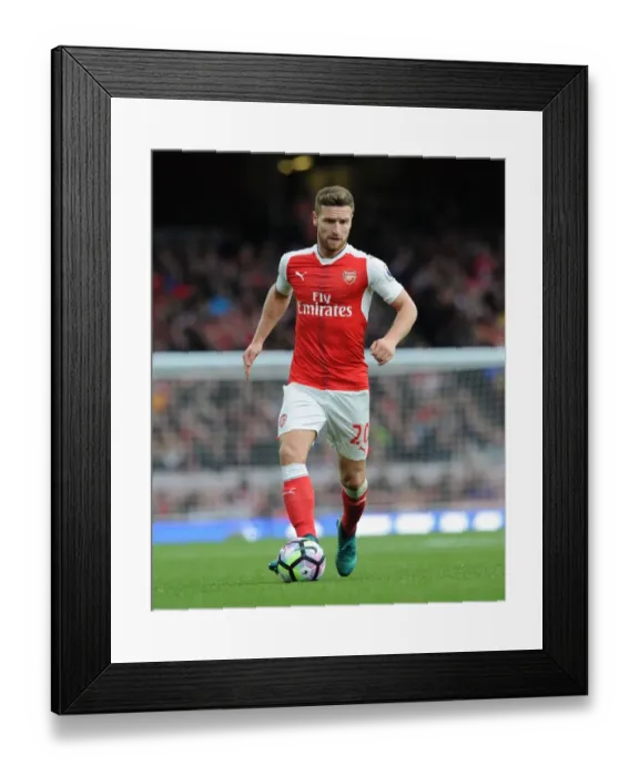 Framed Print : Shkodran Mustafi Focuses in Arsenal's Victory Against Middlesbrough (2016-17)