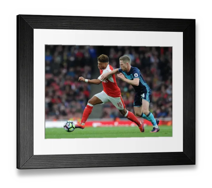 Framed Print : Arsenal's Oxlade-Chamberlain Clashes with Middlesbrough's Forshaw in Premier League Showdown Framed Print : Arsenal's Oxlade-Chamberlain Clashes with Middlesbrough's Forshaw in Premier League Showdown