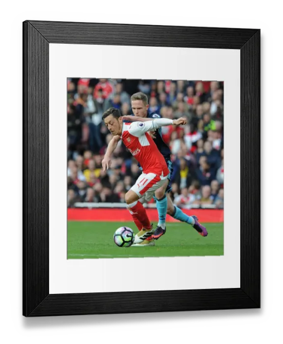 Framed Print : Mesut Ozil vs. Adam Forshaw: A Premier League Battle at Emirates Stadium (2016-17) Framed Print : Mesut Ozil vs. Adam Forshaw: A Premier League Battle at Emirates Stadium (2016-17)