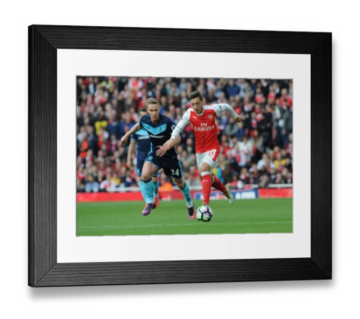 Framed Print : Mesut Ozil vs. Adam Forshaw: A Premier League Battle at Emirates Stadium (2016-17)