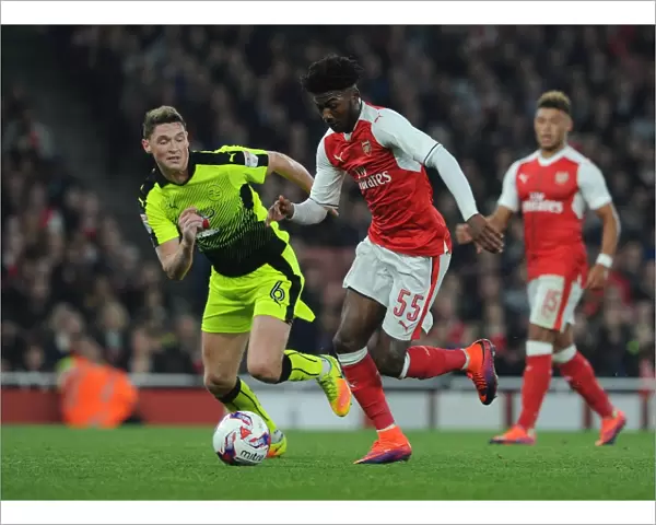 Arsenal's Maitland-Niles Clashes with Reading's Evans in EFL Cup Showdown
