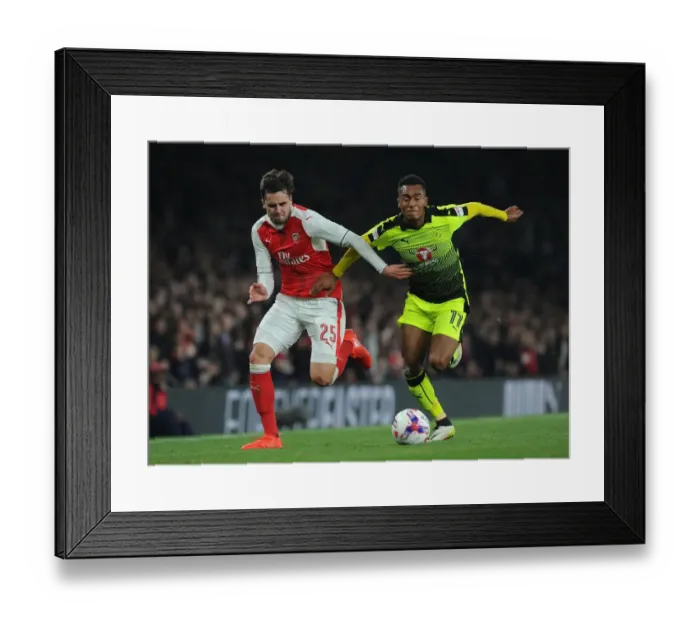 Framed Print : Arsenal's Jenkinson Goes Head-to-Head with Reading's Wieser in EFL Cup Showdown Framed Print : Arsenal's Jenkinson Goes Head-to-Head with Reading's Wieser in EFL Cup Showdown