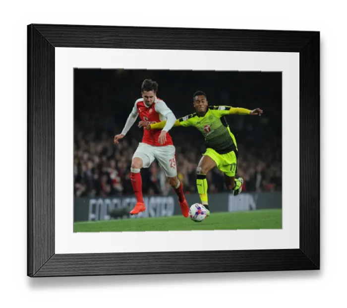 Framed Print : Arsenal's Jenkinson Clashes with Reading's Wieser in EFL Cup Battle