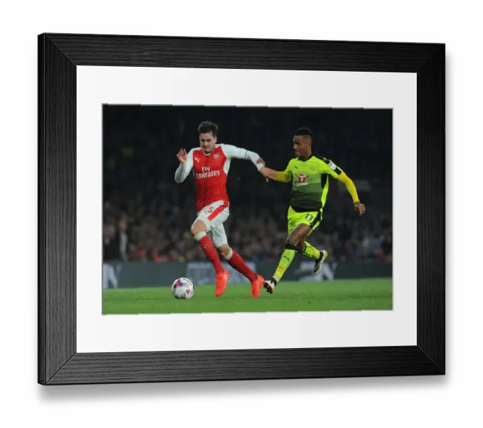 Framed Print : Arsenal's Jenkinson vs. Reading's Wieser: A Fierce EFL Cup Showdown