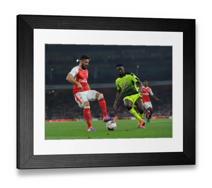 Framed Print : Arsenal's Olivier Giroud Clashes with Reading's Tyler Blackett in EFL Cup Showdown Framed Print : Arsenal's Olivier Giroud Clashes with Reading's Tyler Blackett in EFL Cup Showdown