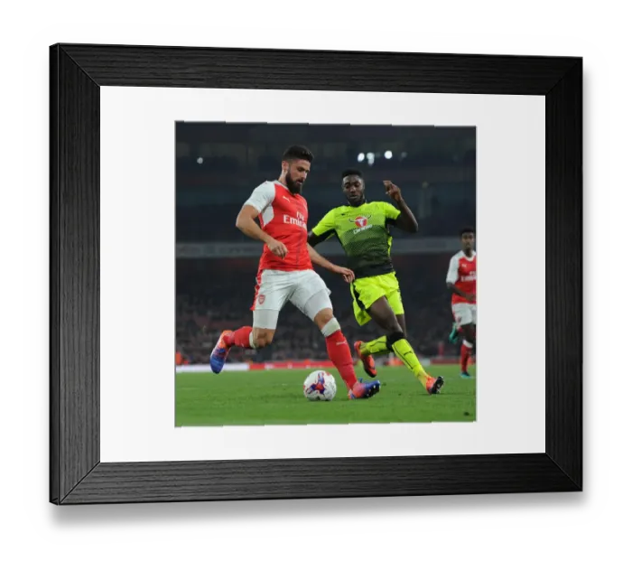 Framed Print : Clash of the Titans: Olivier Giroud vs. Tyler Blackett - Arsenal's EFL Cup Showdown Framed Print : Clash of the Titans: Olivier Giroud vs. Tyler Blackett - Arsenal's EFL Cup Showdown