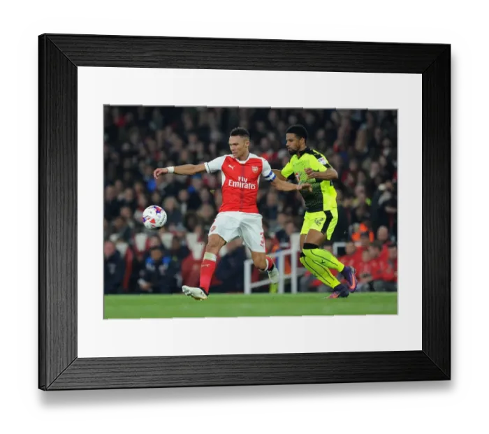 Framed Print : Arsenal's Kieran Gibbs Clashes with Reading's Garath McCleary in EFL Cup Showdown Framed Print : Arsenal's Kieran Gibbs Clashes with Reading's Garath McCleary in EFL Cup Showdown