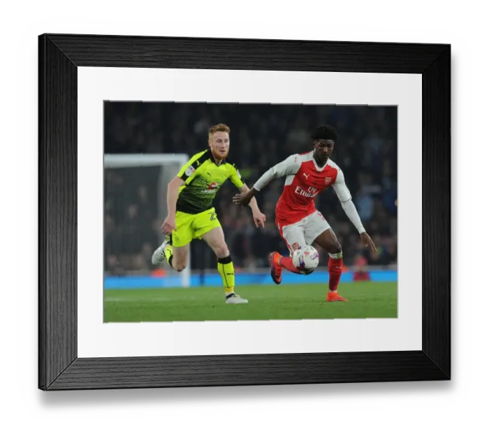 Framed Print : Arsenal's Maitland-Niles Clashes with Reading's Quinn in EFL Cup Showdown