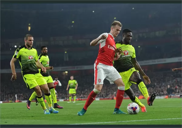 Arsenal's Rob Holding Clashes with Reading's Tyler Blackett in EFL Cup Showdown