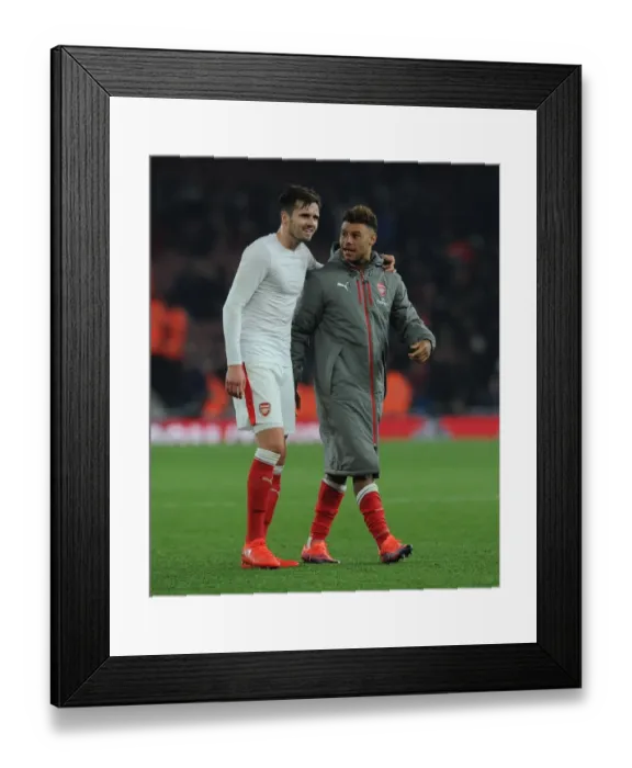 Framed Print : Arsenal's Oxlade-Chamberlain and Jenkinson Celebrate EFL Cup Victory over Reading Framed Print : Arsenal's Oxlade-Chamberlain and Jenkinson Celebrate EFL Cup Victory over Reading