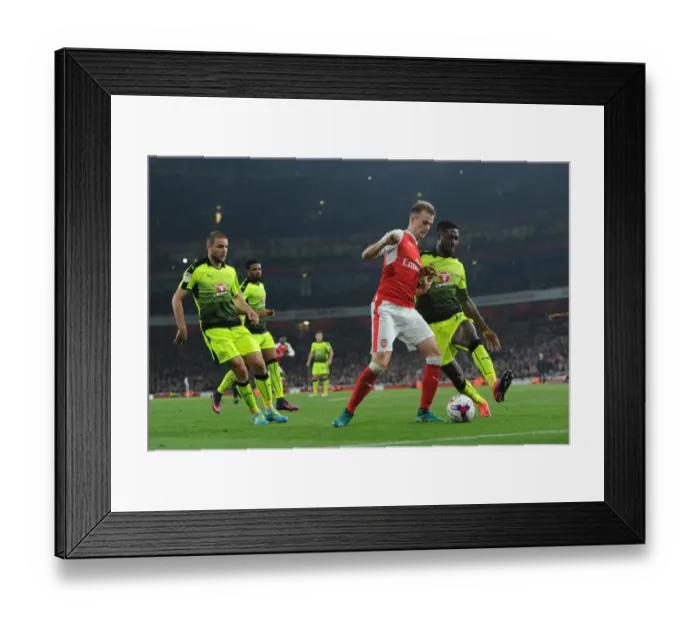 Framed Print : Clash of Titans: Rob Holding vs. Tyler Blackett in Intense EFL Cup Showdown