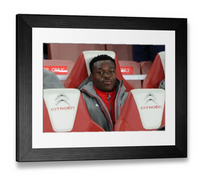 Framed Print : Marc Bola: Arsenal's Ready-to-Rise Star in EFL Cup Clash vs. Reading