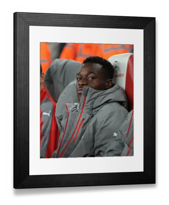 Framed Print : Marc Bola: Arsenal's Ready-for-Action Defender Ahead of Arsenal v Reading EFL Cup Clash Framed Print : Marc Bola: Arsenal's Ready-for-Action Defender Ahead of Arsenal v Reading EFL Cup Clash