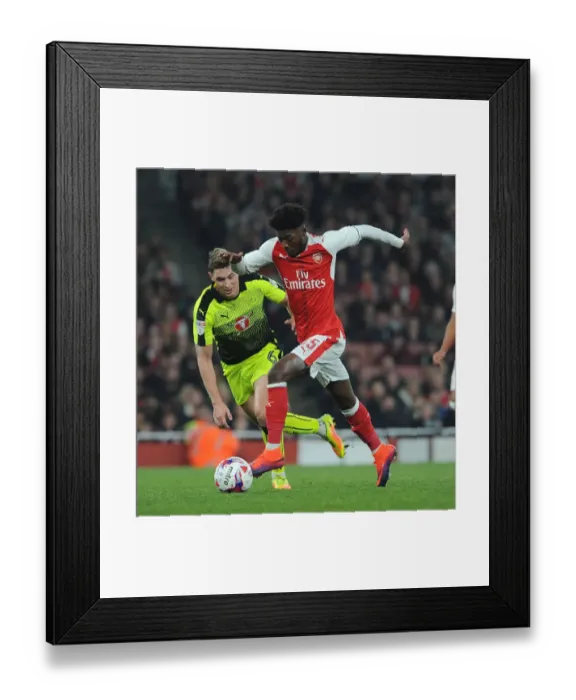 Framed Print : Arsenal's Ainsley Maitland-Niles Clashes with Reading's George Evans in EFL Cup Showdown Framed Print : Arsenal's Ainsley Maitland-Niles Clashes with Reading's George Evans in EFL Cup Showdown