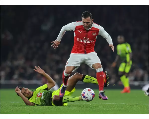 Arsenal's Lucas Perez Faces Off Against Reading's Tennai Watson in EFL Cup Clash