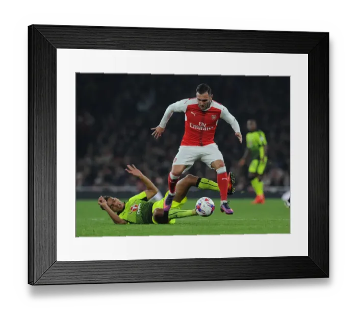 Framed Print : Arsenal's Lucas Perez Faces Off Against Reading's Tennai Watson in EFL Cup Clash