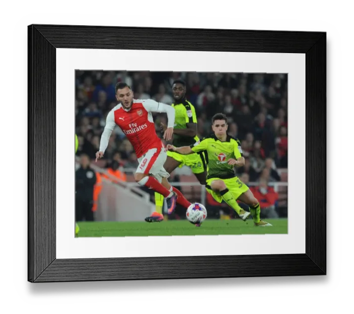 Framed Print : Arsenal's Lucas Perez Clashes with Reading's Liam Kelly in EFL Cup Showdown
