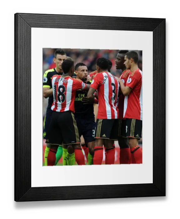 Framed Print : Clash at Stadium of Light: Coquelin vs. Van Aanholt and Defoe in Sunderland v Arsenal (2016-17)
