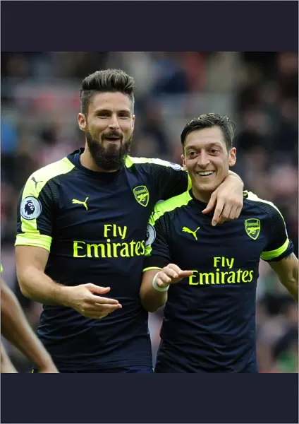 Arsenal's Unstoppable Duo: Giroud and Ozil's Euphoric Goal Celebration (2016-17) - Sunderland vs. Arsenal