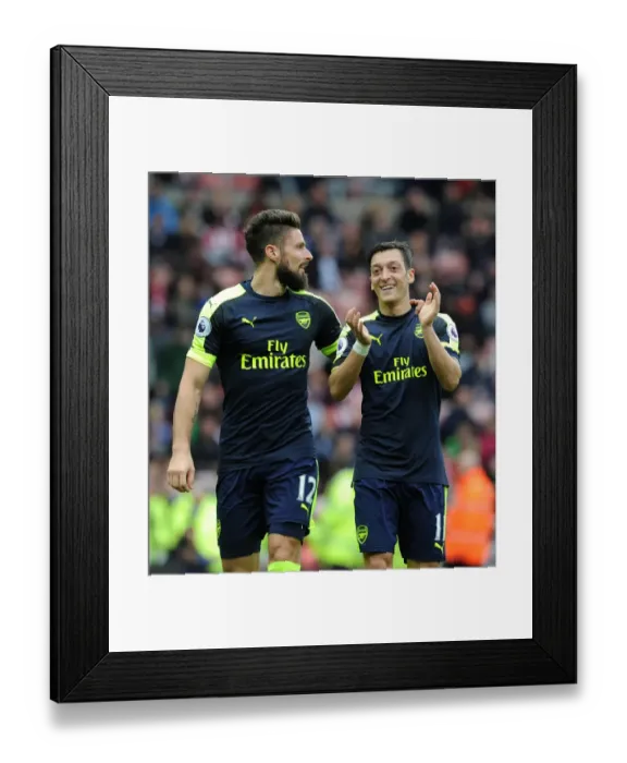 Framed Print : Olivier Giroud and Mesut Ozil's Celebration: Arsenal's Dominance over Sunderland (2016-17)