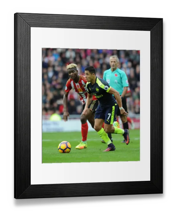 Framed Print : Clash of Stars: Sanchez vs. Ndong in Sunderland v Arsenal Premier League Showdown Framed Print : Clash of Stars: Sanchez vs. Ndong in Sunderland v Arsenal Premier League Showdown