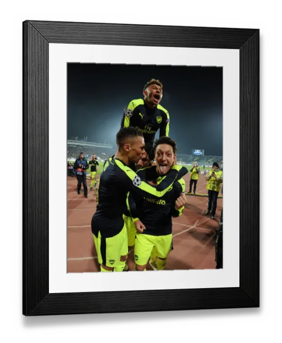 Framed Print : Mesut Ozil's Hat-Trick: Arsenal's Victory Over Ludogorets Razgrad in the 2016-17 UEFA Champions League