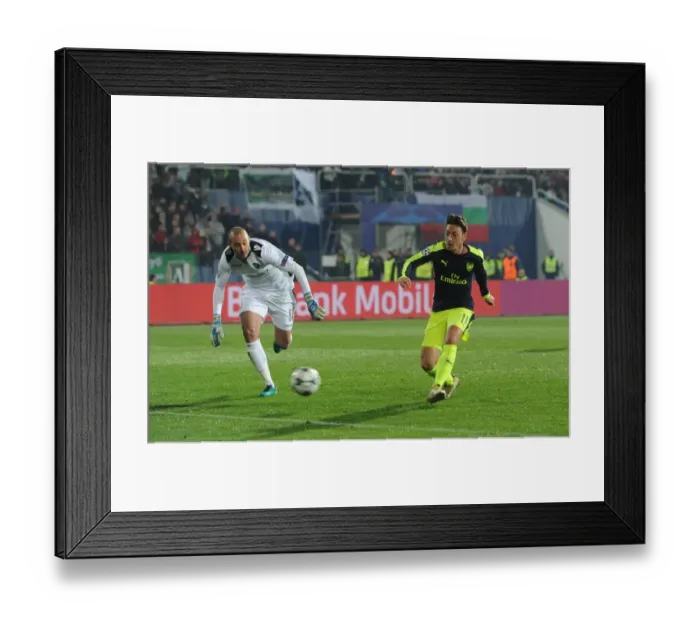 Framed Print : Mesut Ozil Scores for Arsenal Against Ludogorets in UEFA Champions League Framed Print : Mesut Ozil Scores for Arsenal Against Ludogorets in UEFA Champions League
