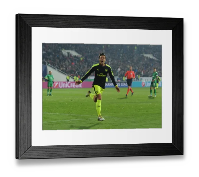 Framed Print : Mesut Ozil's Decisive Goal: Arsenal's Triumph over Ludogorets Razgrad in the 2016-17 UEFA Champions League Framed Print : Mesut Ozil's Decisive Goal: Arsenal's Triumph over Ludogorets Razgrad in the 2016-17 UEFA Champions League