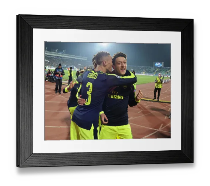 Framed Print : Mesut Ozil and Kieran Gibbs Celebrate Arsenal's Third Goal Against Ludogorets Razgrad in 2016-17 UEFA Champions League Framed Print : Mesut Ozil and Kieran Gibbs Celebrate Arsenal's Third Goal Against Ludogorets Razgrad in 2016-17 UEFA Champions League